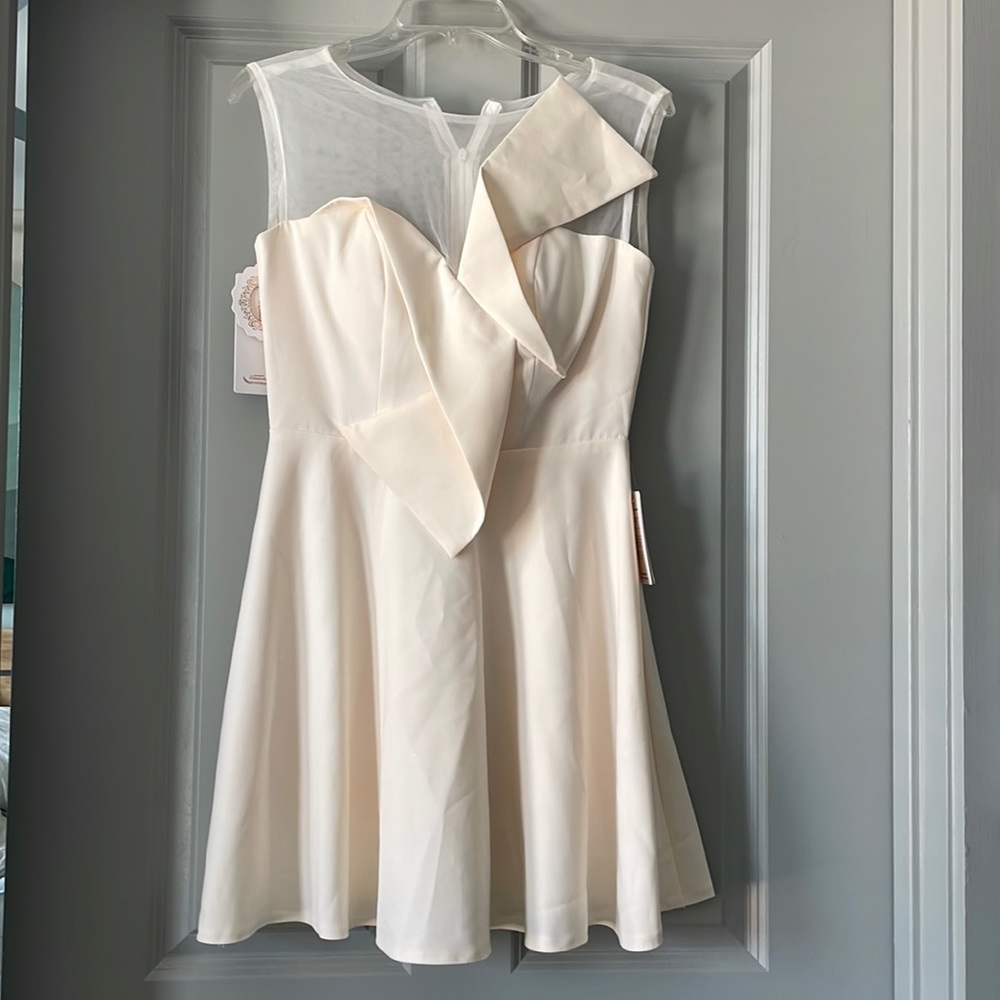 Off-white dress size L but fits like S
